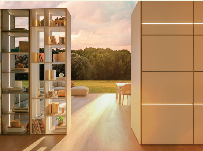 Modern living room cabinetry with warm neutral finishes, open shelving, integrated lighting, and natural outdoor views for a sustainable European home design.
