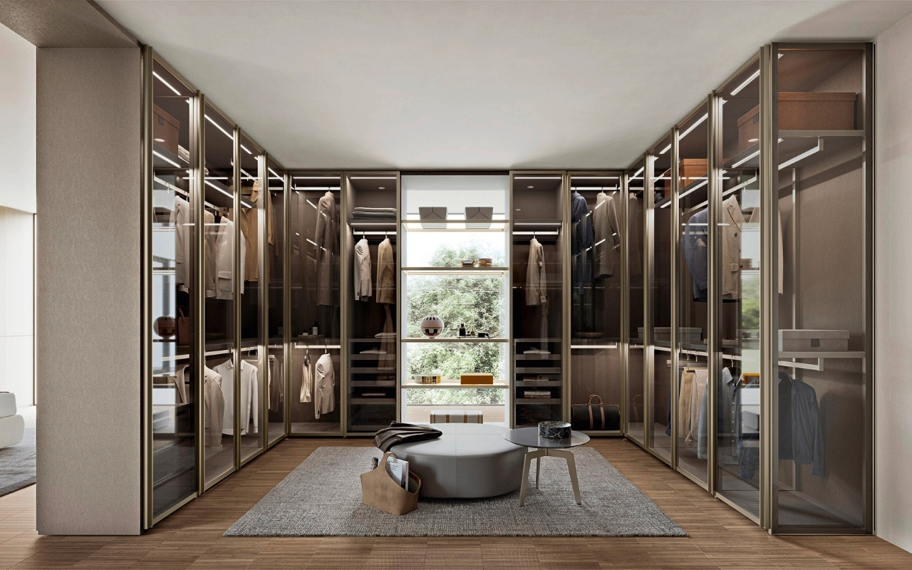 Luxury custom walk-in closet showroom with modern wood shelving, wardrobe storage, and premium interior design solutions.