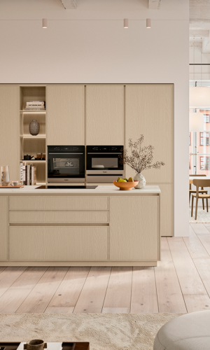 3D kitchen rendering with light wood cabinetry, integrated appliances, open shelving, large island, soft neutral finishes, and bright natural light.